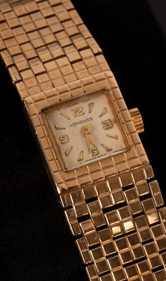 Lot 344 - A Longines gold watch with gold bracelet