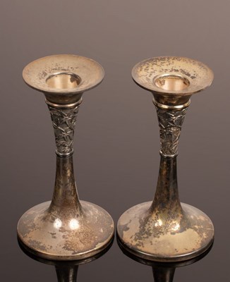 Lot 364 - A pair silver trumpet shaped candlesticks...