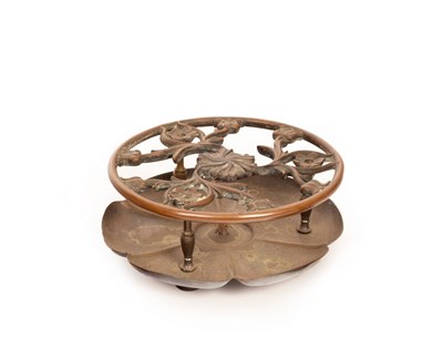 Lot 383 - A Christopher Dresser trivet with pierced...