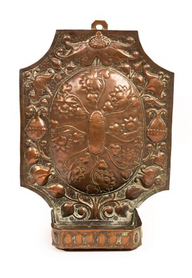 Lot 403 - A John Pearson repousse copper wall sconce,...