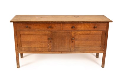 Lot 438 - Ambrose Heal for Heals, an Arts & Crafts oak...