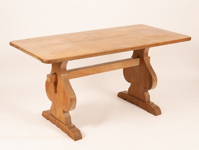 Lot 439 - Ambrose Heal for Heals, an oak table on spade...