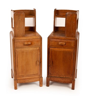 Lot 447 - A pair of Arts & Crafts style walnut bedside...