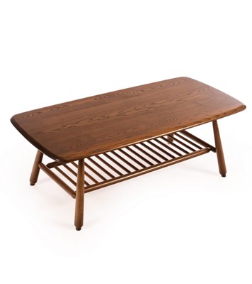 Lot 460 - An Ercol dark elm coffee table with magazine...