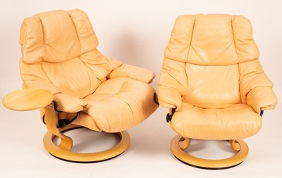 Lot 490 - A pair of Ekornes Stressless chairs in salmon...