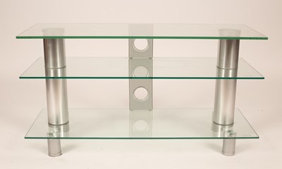 Lot 495 - A modern glass three-tier TV console/table...