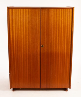 Lot 504 - A mid 20th Century teak 'Magic Box' desk,...