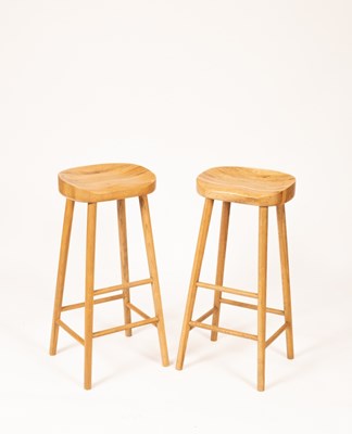 Lot 513 - A pair of oak breakfast bar stools, with...