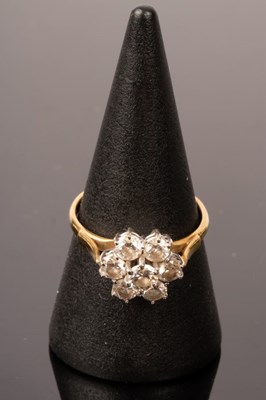 Lot 4 - A diamond cluster ring, JWLd, the seven-stone...