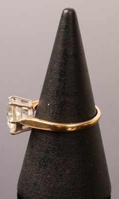 Lot 5 - A diamond solitaire ring, the claw set stone...