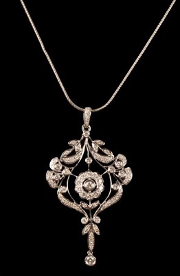 Lot 18 - A diamond pendant of openwork form centred by...
