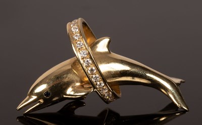 Lot 19 - An Italian bi-colour 14k gold bangle with...
