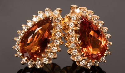 Lot 20 - A citrine and diamond pendant, the inverted...