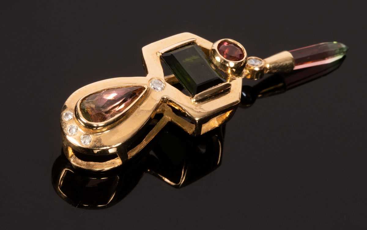 Lot 21 - A multi-gem set pendant of modern design, the...
