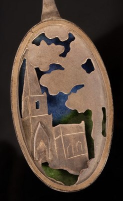 Lot 31 - A silver and enamel oval pendant, EAW, London...