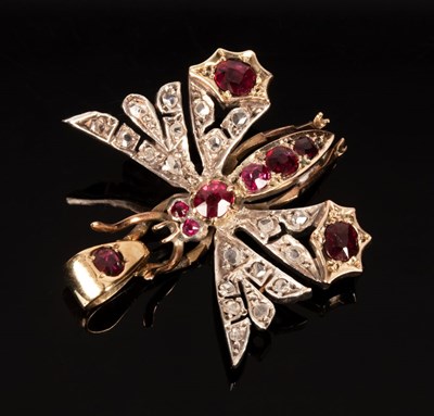 Lot 44 - A ruby and diamond butterfly pendant, the body...