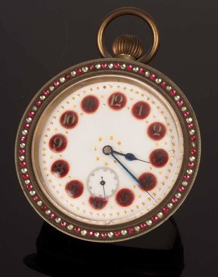 Lot 65 - A bull's eye travelling watch