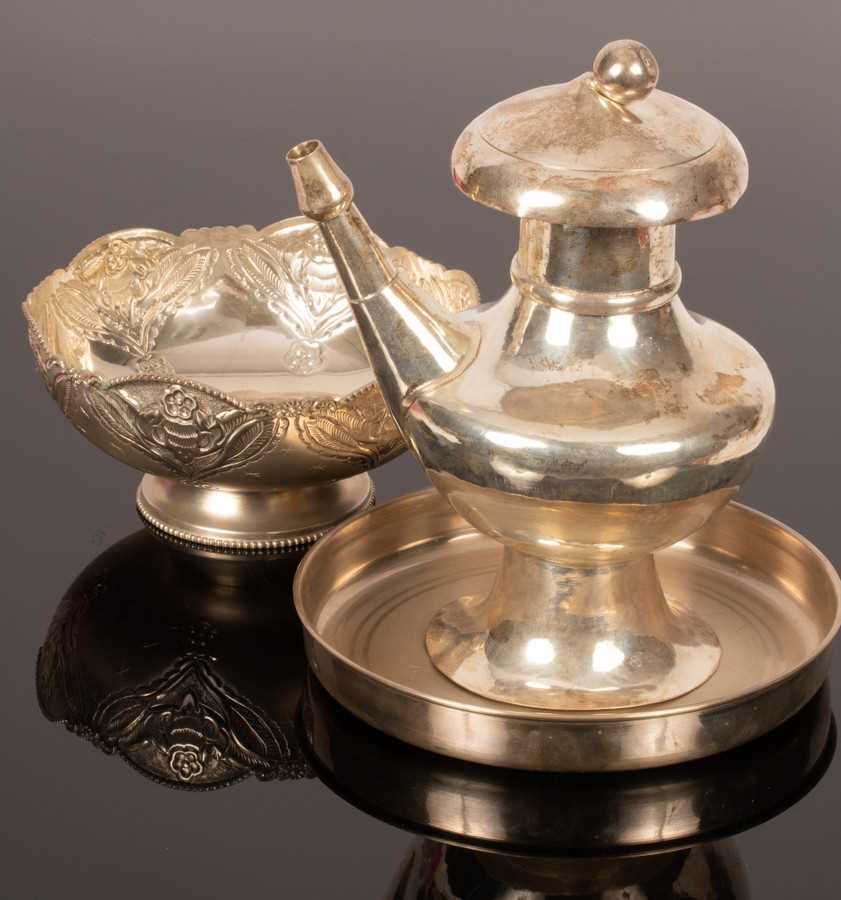 Lot 96 - An Indian white metal coffee pot, 23cm high, a...