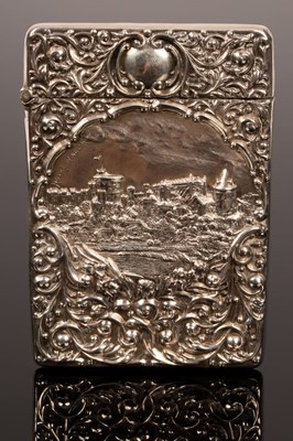 Lot 107 - A castle top embossed silver visiting card...