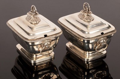 Lot 120 - A pair of George III rectangular silver sauce...