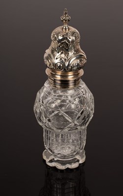 Lot 135 - A cut glass sugar caster with silver cover,...