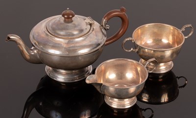 Lot 137 - A three-piece silver tea service, SLD,...