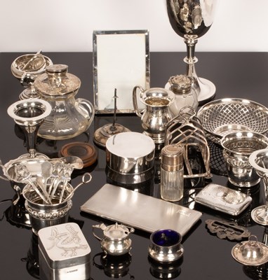 Lot 146 - A silver prize cup, various silver vases, jugs,...