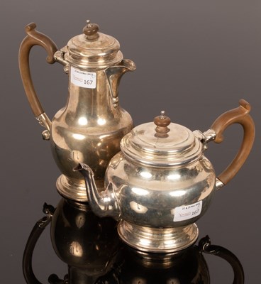 Lot 167 - A George VI silver coffee pot and matching...