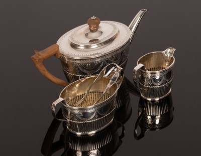 Lot 172 - A Victorian silver tea set, Holland, Son &...