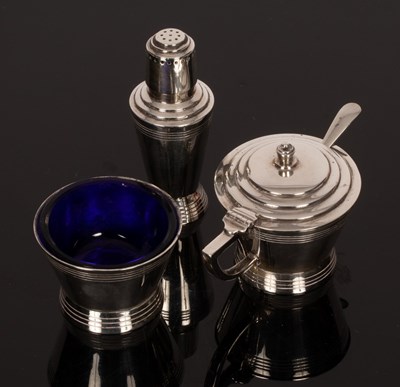 Lot 174 - An Art Deco three-piece silver cruet set,...