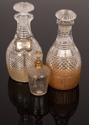 Lot 183 - Two cut glass decanters, a silver sherry label...