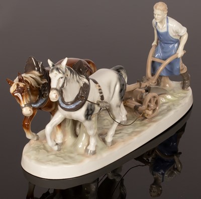 Lot 210 - A German figural group of a ploughman and team,...