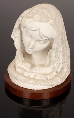 Lot 220 - A Lladro bust of young girl wearing a white...