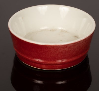 Lot 244 - A Chinese monochrome porcelain bowl, Hongyou,...