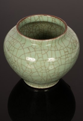 Lot 246 - A Chinese celadon porcelain jar, Fanggeyou,...