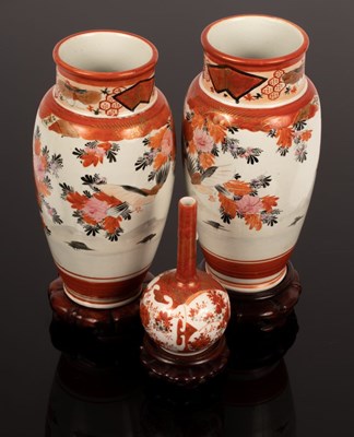 Lot 262 - A pair of Imari baluster vases, 24cm high,...