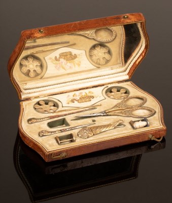 Lot 362 - A Palais Royal sewing set, cased in a brown...