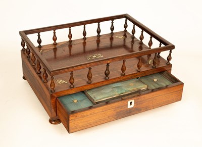 Lot 365 - A Regency rosewood workbox, with galleried top...