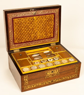 Lot 374 - A Regency rosewood workbox, the cover inlaid...