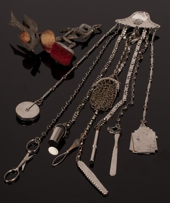 Lot 409 - A cut steel chatelaine the trails hung...