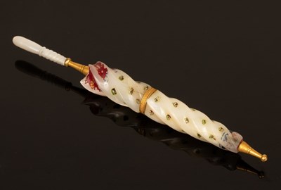 Lot 419 - A mother-of-pearl needle case in the form of...