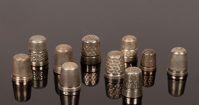 Lot 429 - Four sterling silver thimbles, The Spa, Henry...