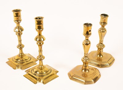 Lot 491 - A pair of 18th Century brass candlesticks with...