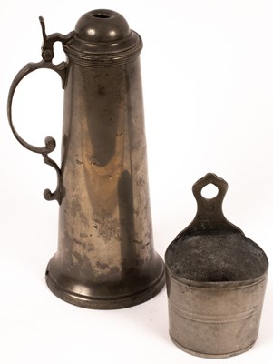 Lot 492 - A pewter flagon with scrolled handle and lid,...