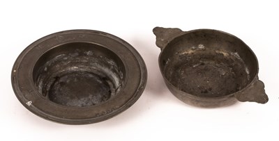 Lot 494 - A pewter two-handled dish, 17cm diameter and a...