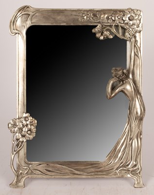 Lot 497 - A WMF style frame with a semi-clad woman...