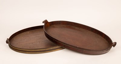 Lot 502 - Two George III mahogany and brass bound trays,...