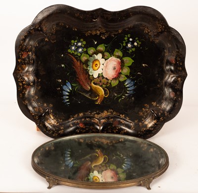 Lot 508 - A toleware tray painted an exotic bird and...