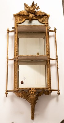 Lot 632 - Two giltwood and plaster mirror back shelves,...