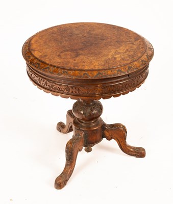 Lot 639 - A mid Victorian circular figural walnut...